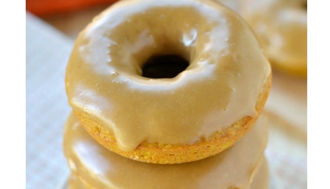 Baked pumpkin spice donuts with maple glaze