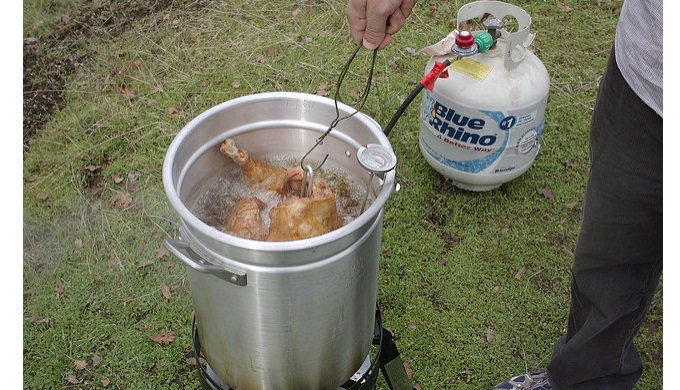 Deep frying turkey requires keeping an eye on the temperature of the oil and the bird