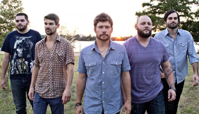 Shane Smith and The Saints in a field