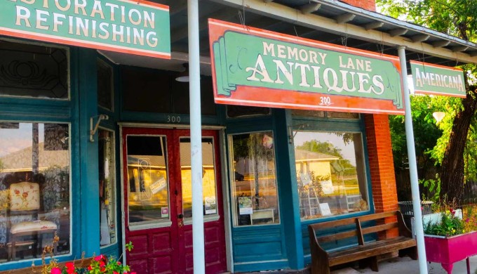 Colorful stores with antique store signs
