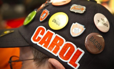 Carol Hoepfner wearing her personalized Whataburger cap with buttons